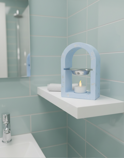 Brucia essenze in ecoresina con dettagli in foglia argento, design ad arco con ciotolina in metallo e supporto per candela tealight